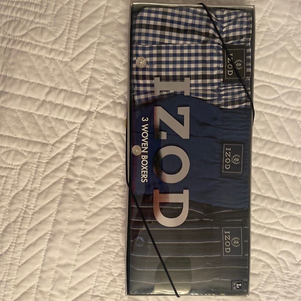 Three woven boxers by Izod. Men’s size large, 36–38 waist.